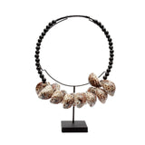 The Tiger Cowrie Necklace Black Wood on Stand home deco bohosaninterior 