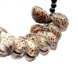 The Tiger Cowrie Necklace Black Wood on Stand home deco bohosaninterior 